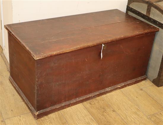 A Victorian pine trunk with painted grain W.110cm